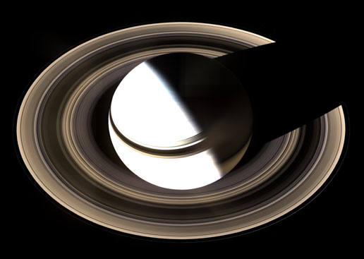 Saturn casting a shadow back across its rings